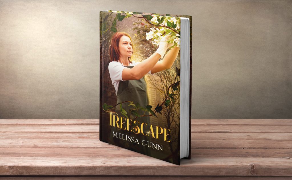 Picture of Tree scape book by Melissa Gunn. Image is of a young woman touching a tree. 